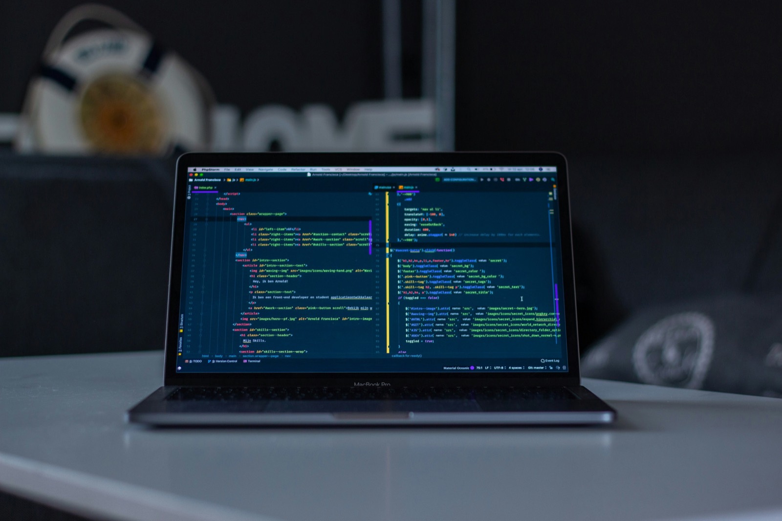 A laptop with a code editor open